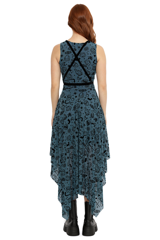 Model styled in Fallout x BlackMilk Commonwealth Choices Wizard Dress showcasing all-over Fallout motif print and belted waist.