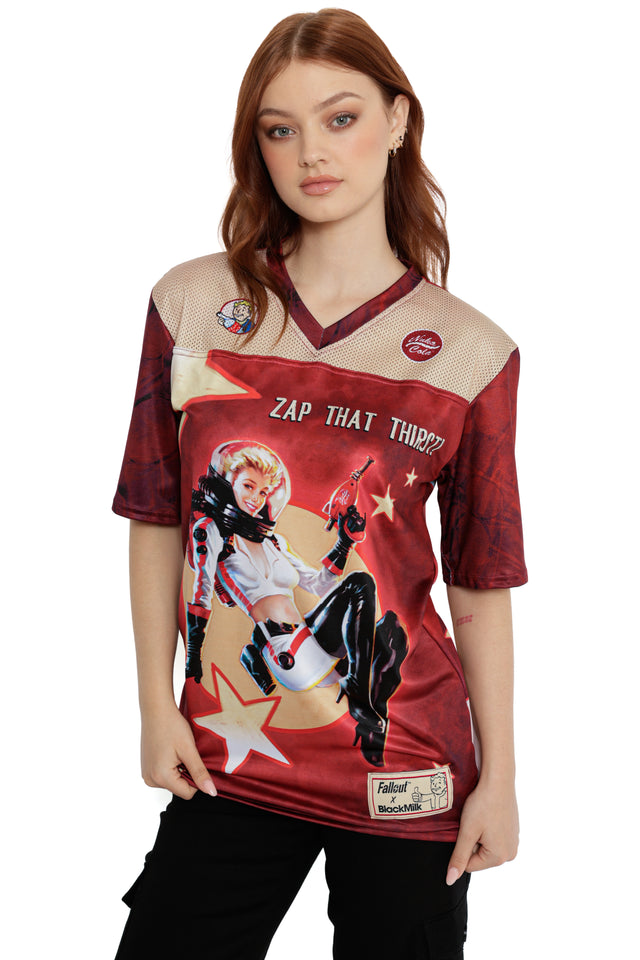 Model styled in Fallout x BlackMilk Nuka-Cola Touchdown Tee showcasing bold retro ad artwork and game-inspired details.